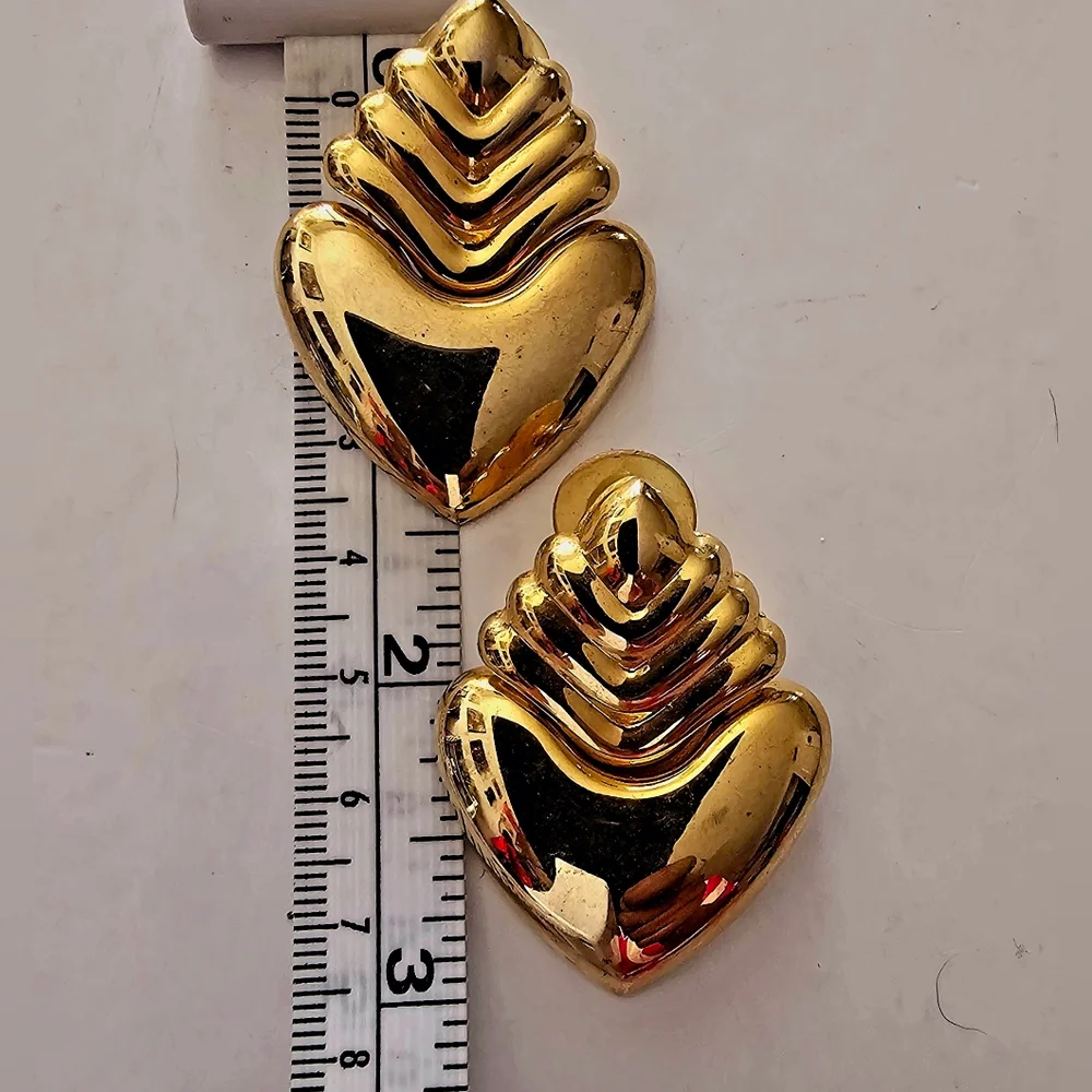 Vintage 1980s gilt gold media heart Escada inspired doorknocker earrings